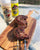 skewered meat with a 12 oz bottle of chop haus blend and 12 oz bottle of steak seasoning