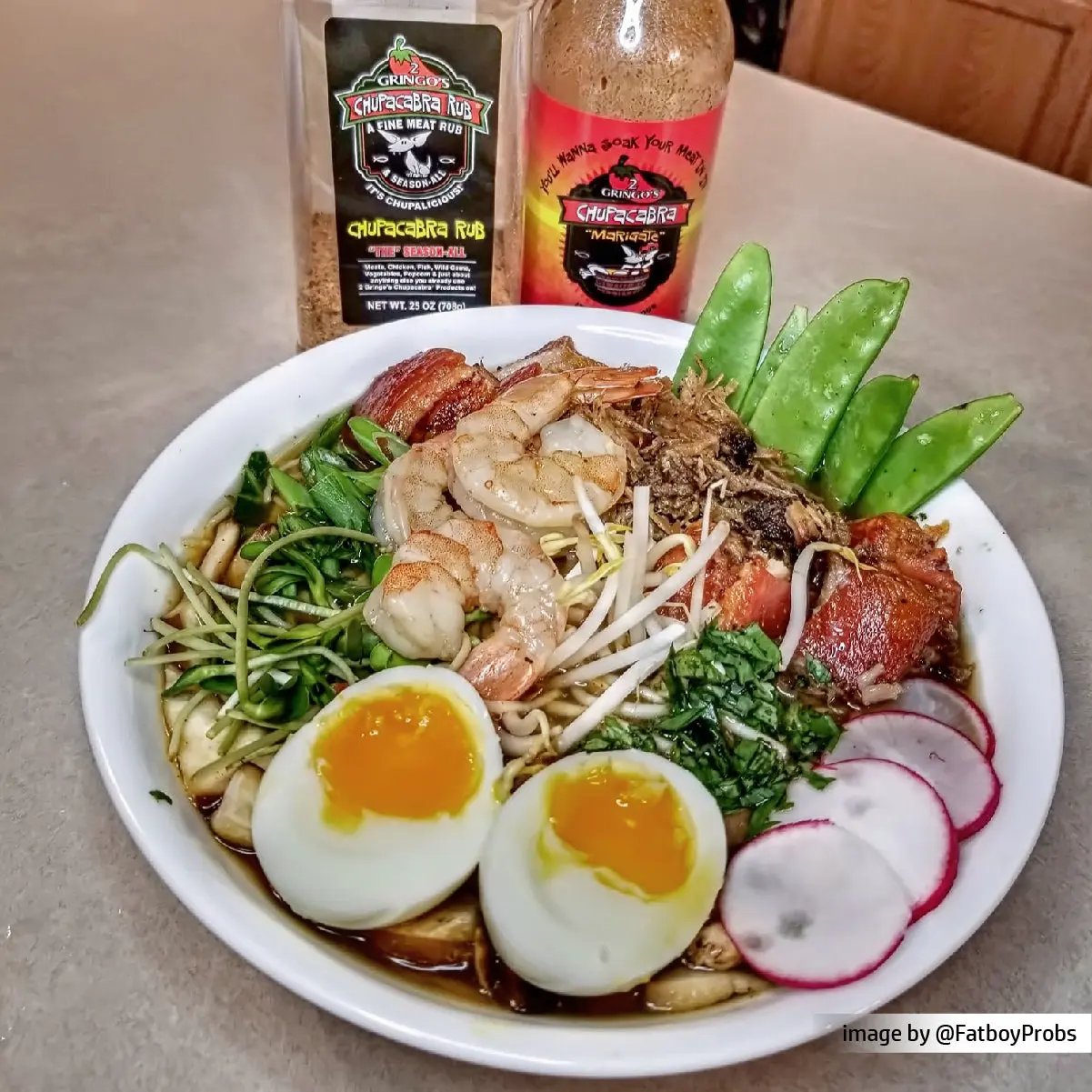 bottle of marigate with a bowl of ramen