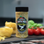 bottle of artisan blend italian seasoning with pasta and vegetables