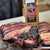 25 oz bottle of brisket magic behind cut brisket